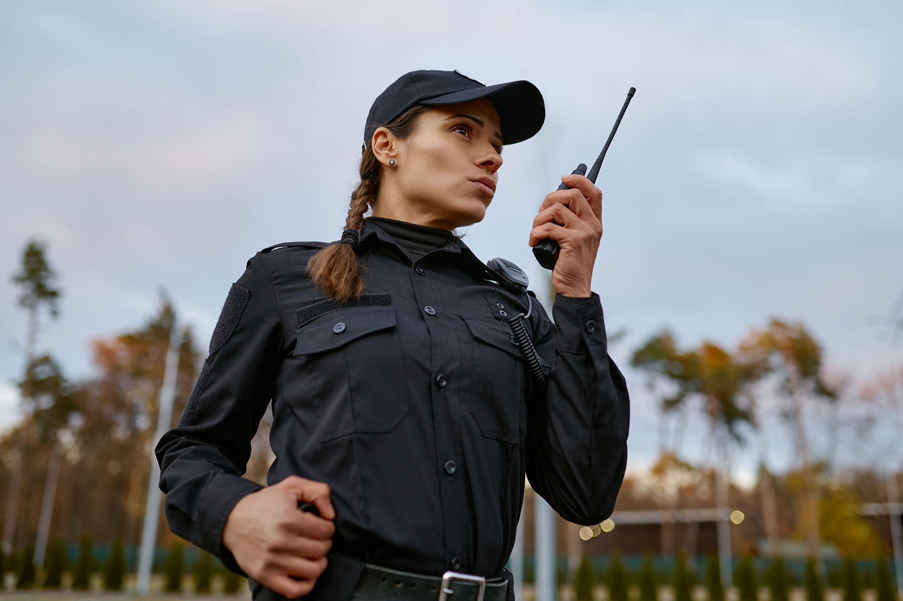 Woman security guard learning advanced concepts for security professionals